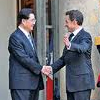 Sarkozy Wins China Cooperation Pledge
